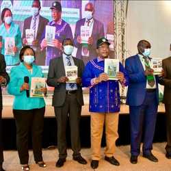 CS Keriako Tobiko launching books during the conference.jpg